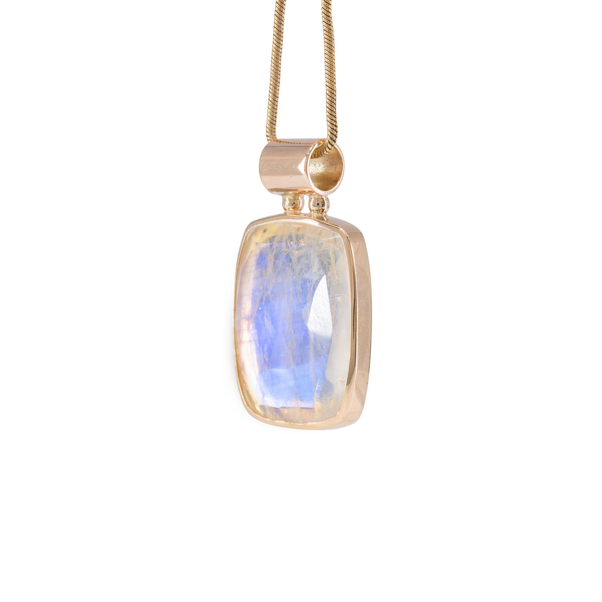 Side view of 14k gold Moonstone pendant showing bezel and blue flash