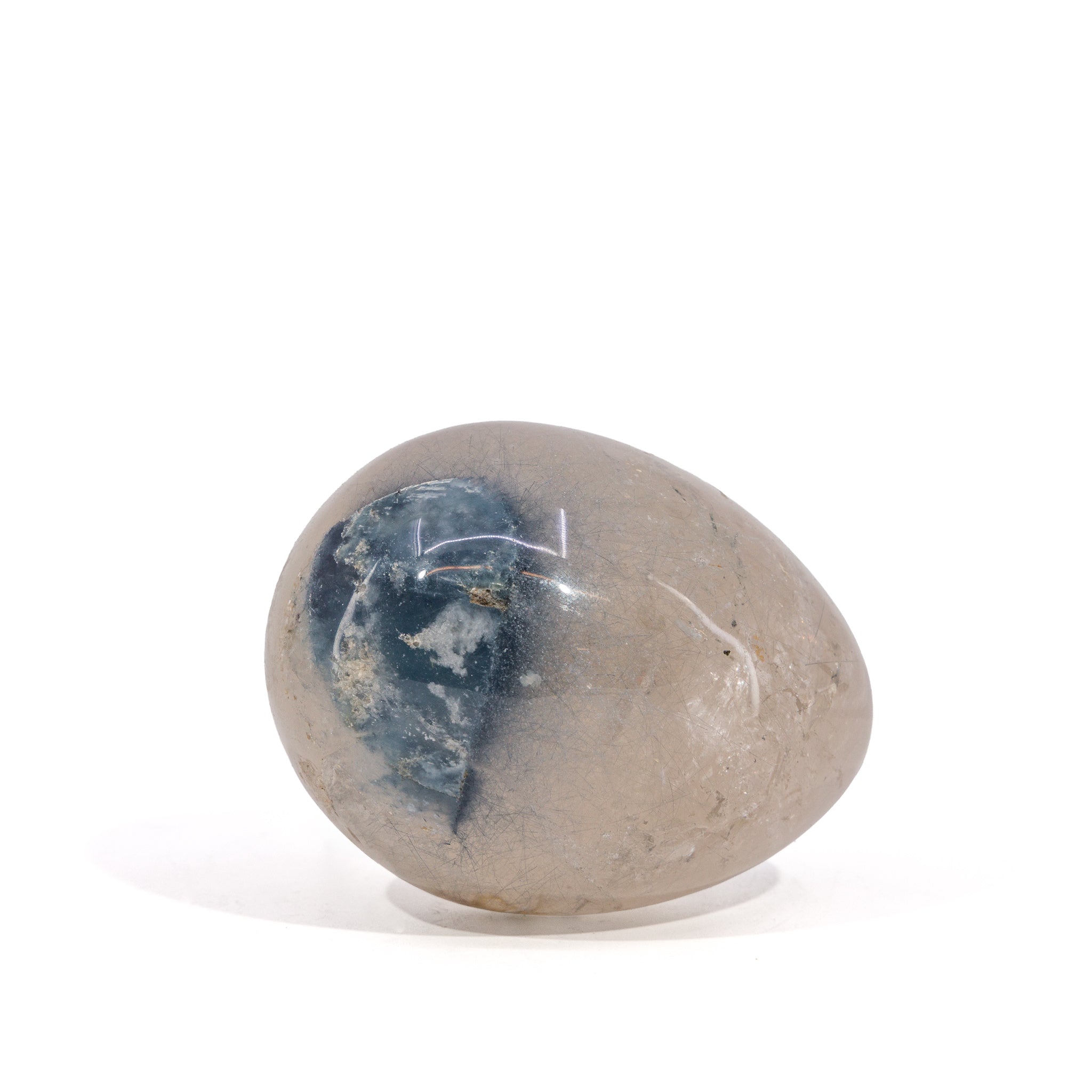Blue Tourmaline in Quartz egg showing concentrated blue color