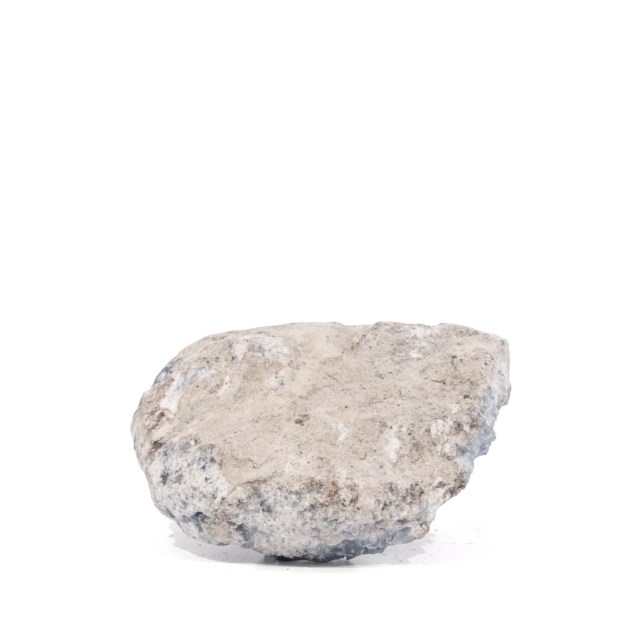Back view of Madagascar Celestite geode showing its pale rough matrix and flat base
