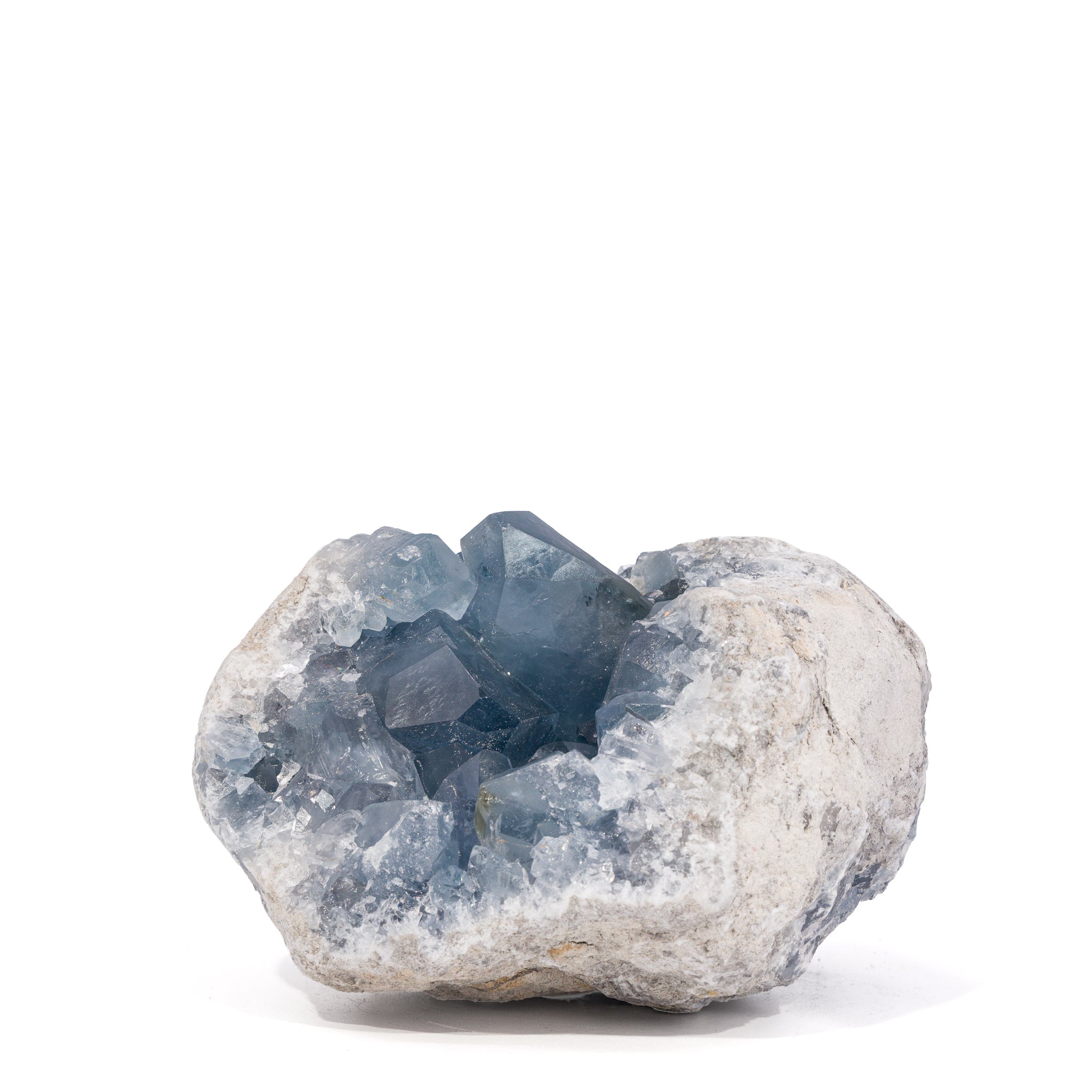Front view of rounded Madagascar Celestite geode with large deep blue-gray crystals