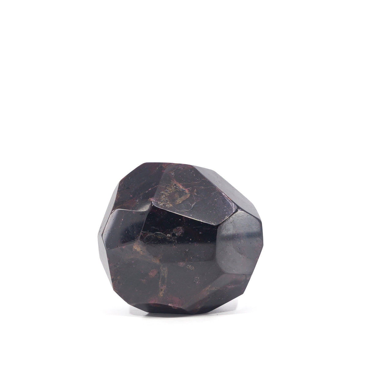 Front view of faceted dark wine-red Garnet freeform crystal