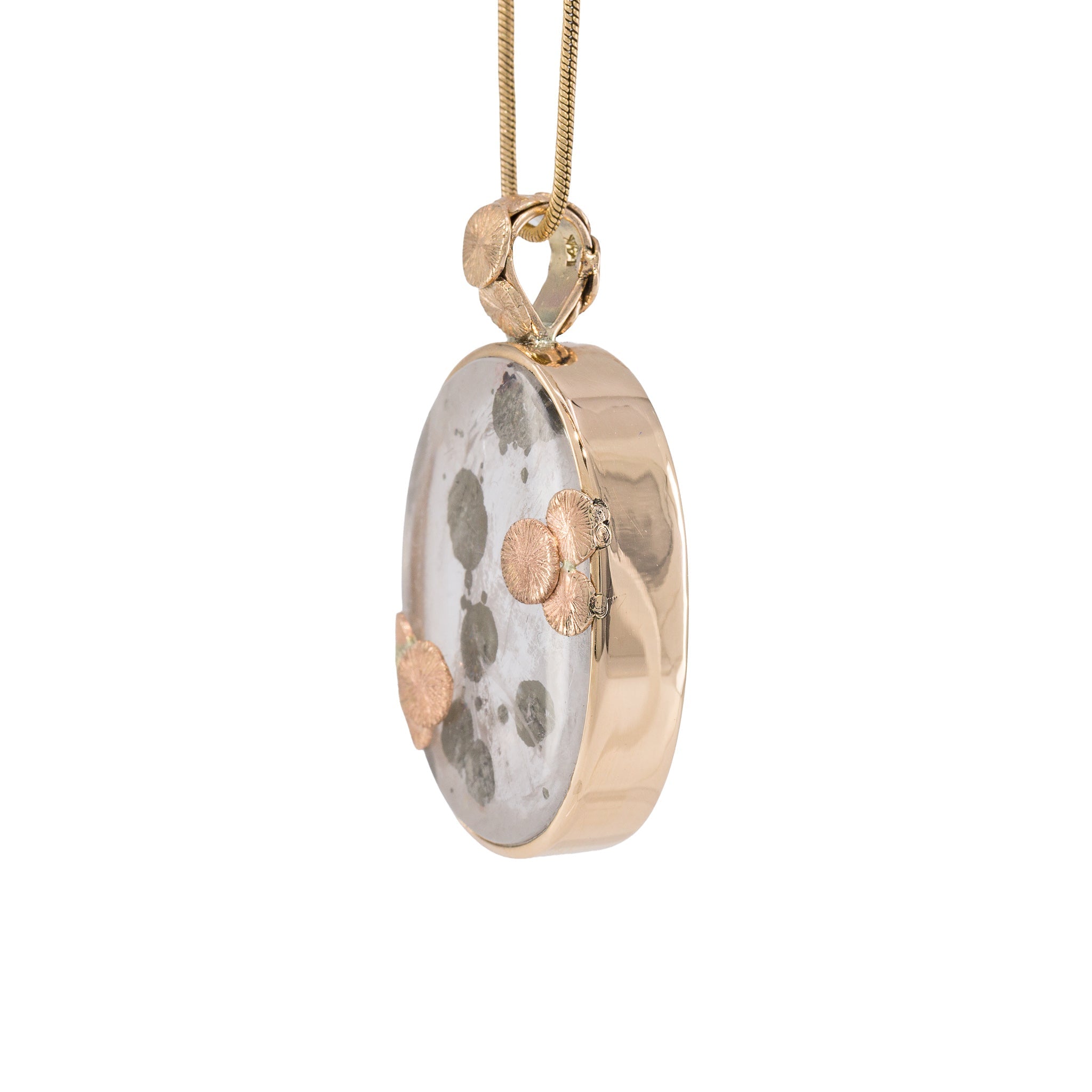 Side view of Marcasite Suns in Quartz pendant showing its substantial 14K gold bezel