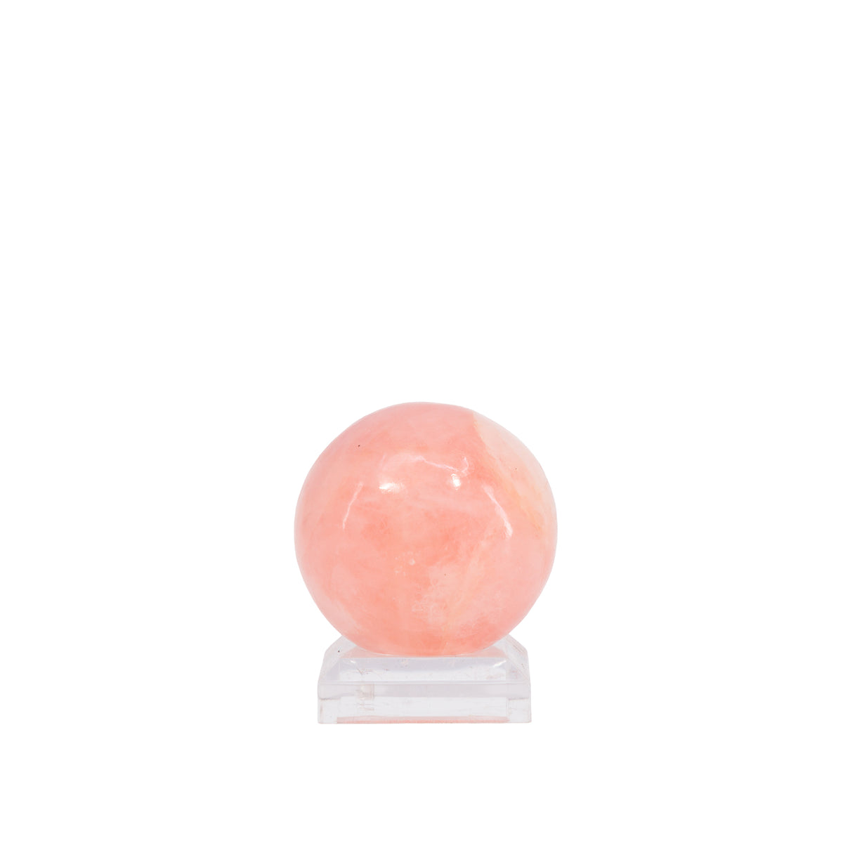 Side view of peach-pink polished Morganite sphere