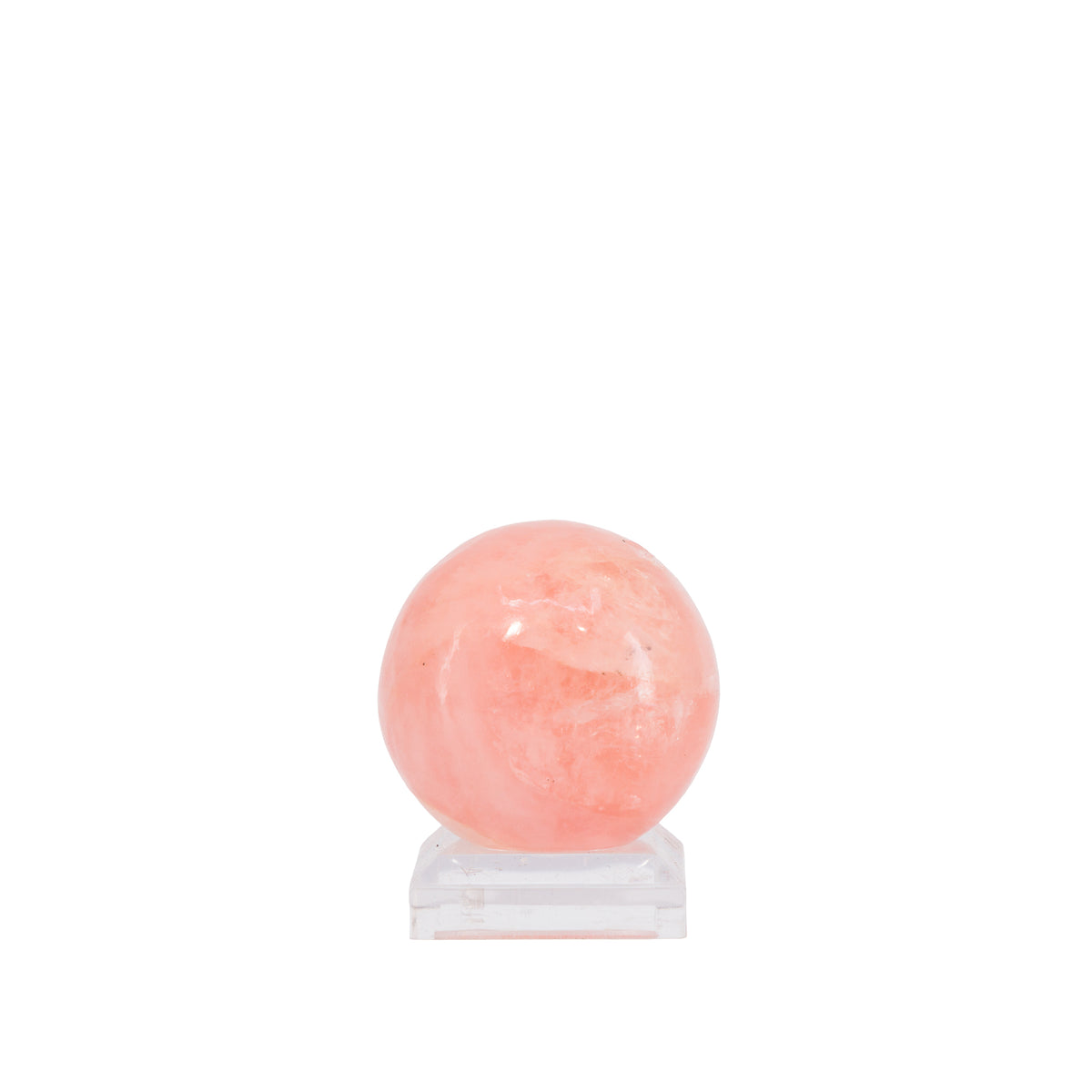Peach-pink Morganite polished gemstone sphere, front view