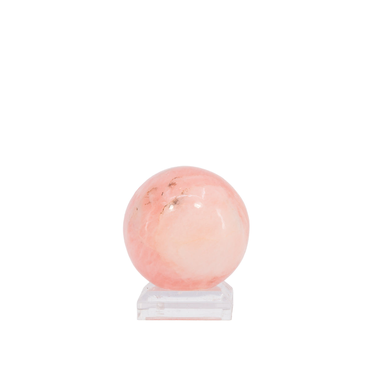 Morganite sphere showing milky translucent zone and natural inclusions