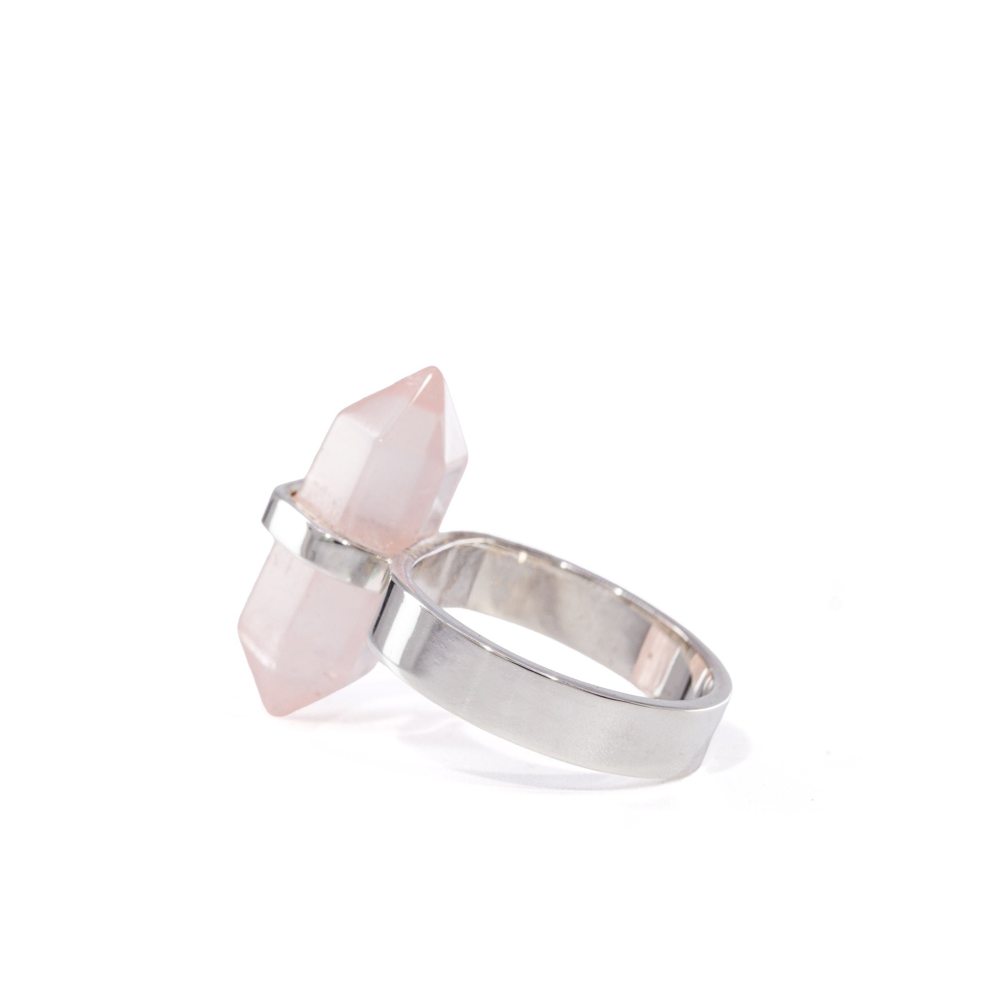 Three-quarter view of elongated Rose Quartz double-terminated crystal ring