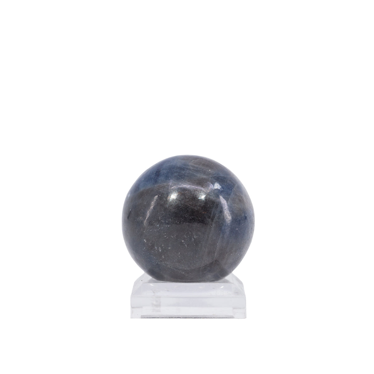 Sapphire sphere showing charcoal areas and blue banding