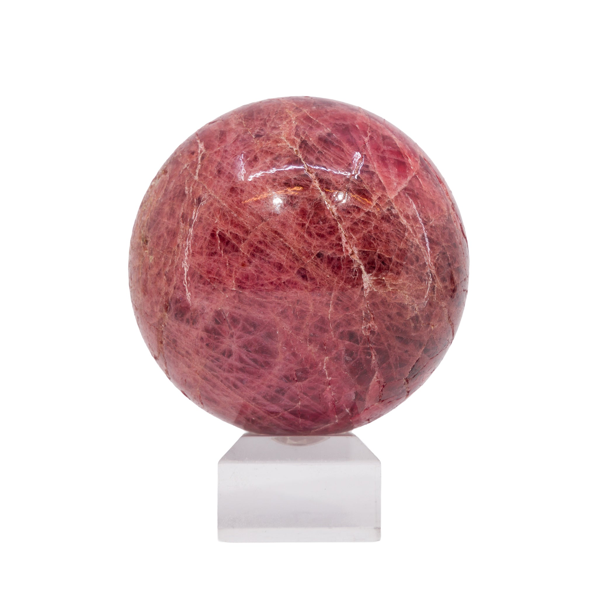 Front view of large polished Spinel crystal sphere from Tanzania