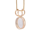 Reverse angled view of faceted Moonstone charm pendant in 14K gold