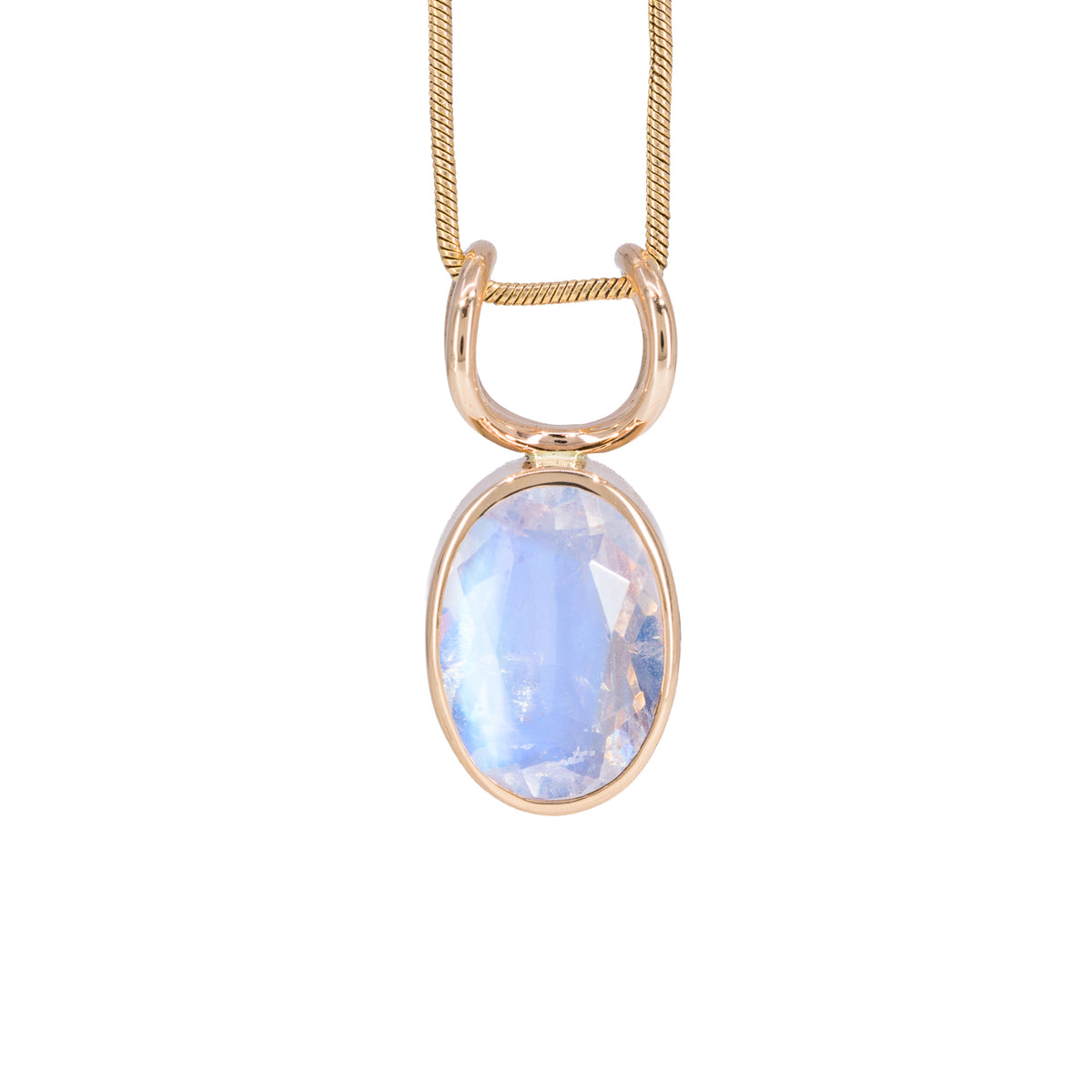 Faceted oval Moonstone charm pendant in 14K gold with cool blue flash