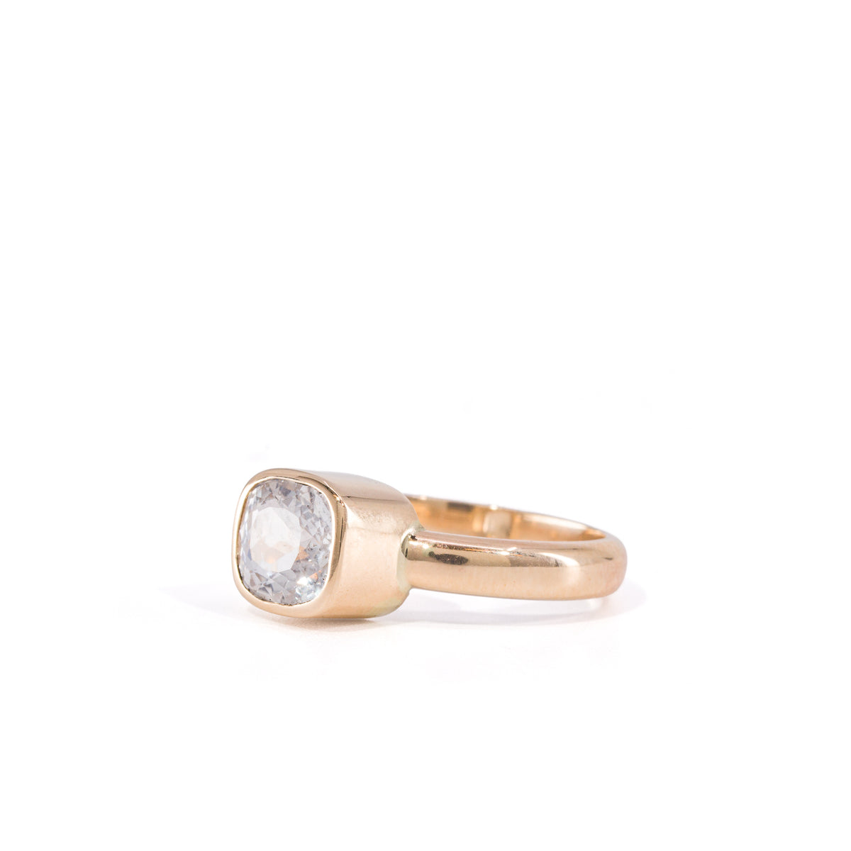 Faceted Phenakite gemstone ring handcrafted in 14K, three-quarter view