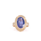 Faceted Tanzanite ring handcrafted in 14K, straight front view