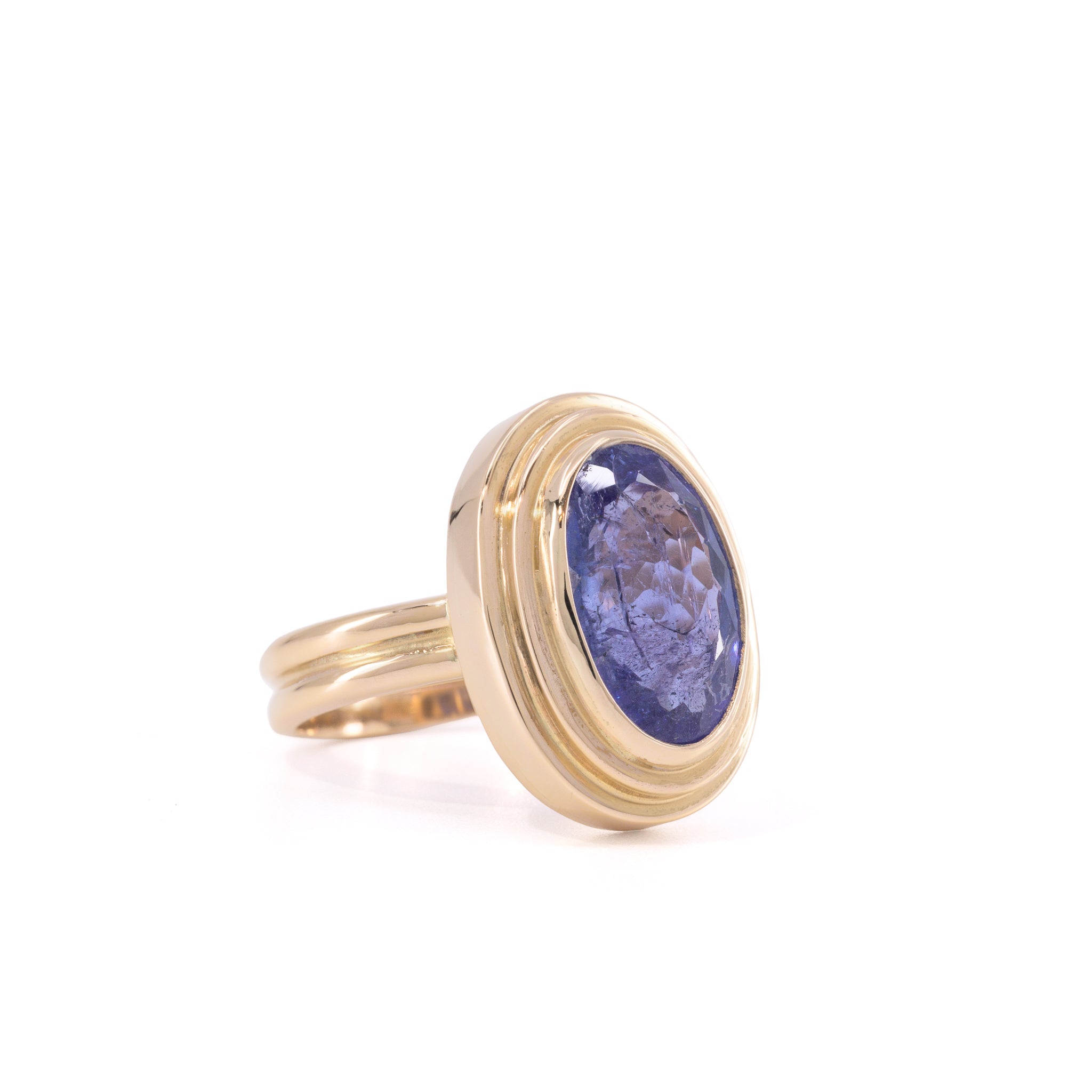Faceted Tanzanite ring handcrafted in 14K, front three-quarter view