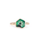 Front view of 14k gold ring with green six-rayed Trapiche Emerald