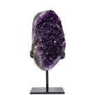 Deep purple Amethyst geode displayed on a black metal stand, front view