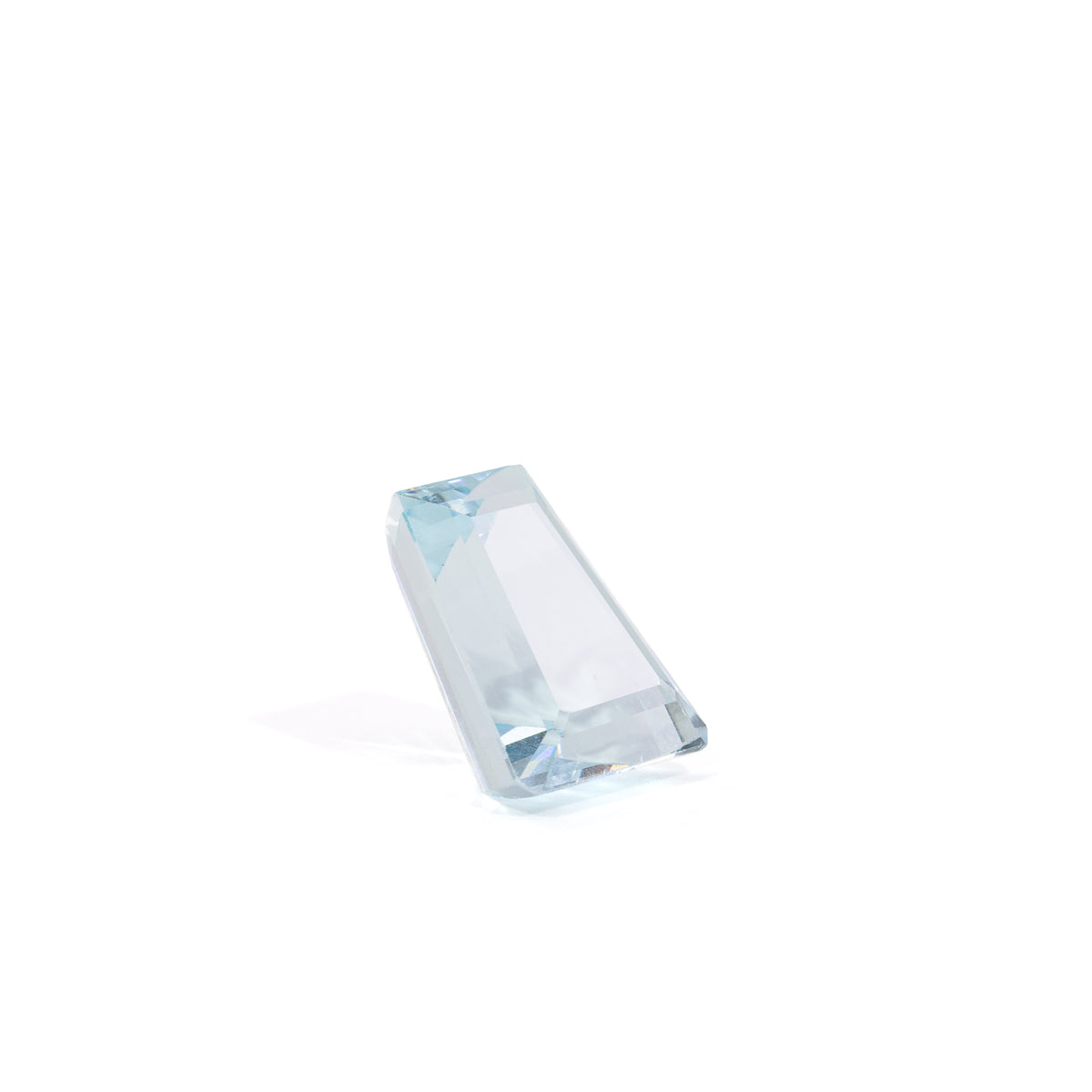 Elongated tapered step-cut Aquamarine gemstone, front view