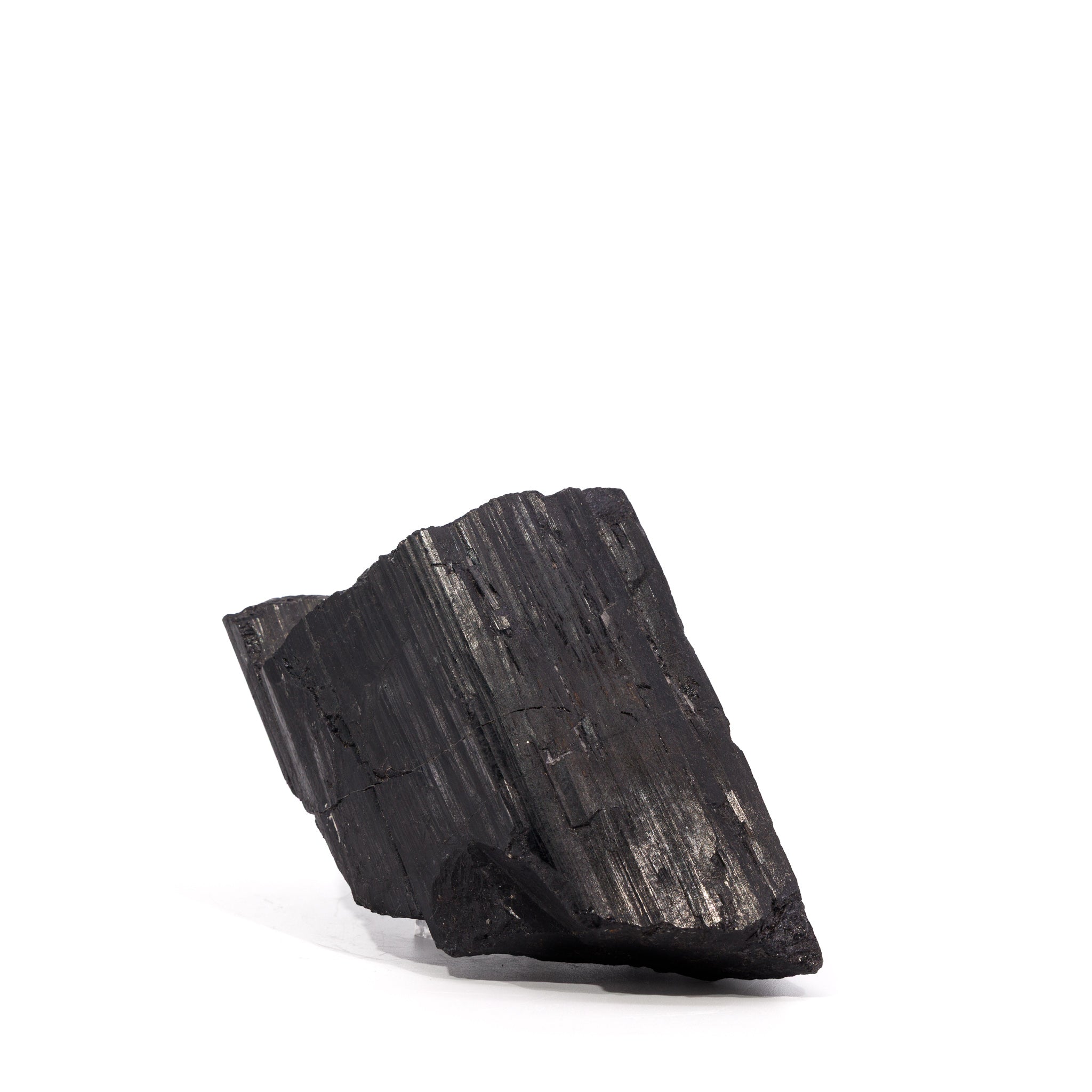 Black Tourmaline crystal with intergrown prismatic faces