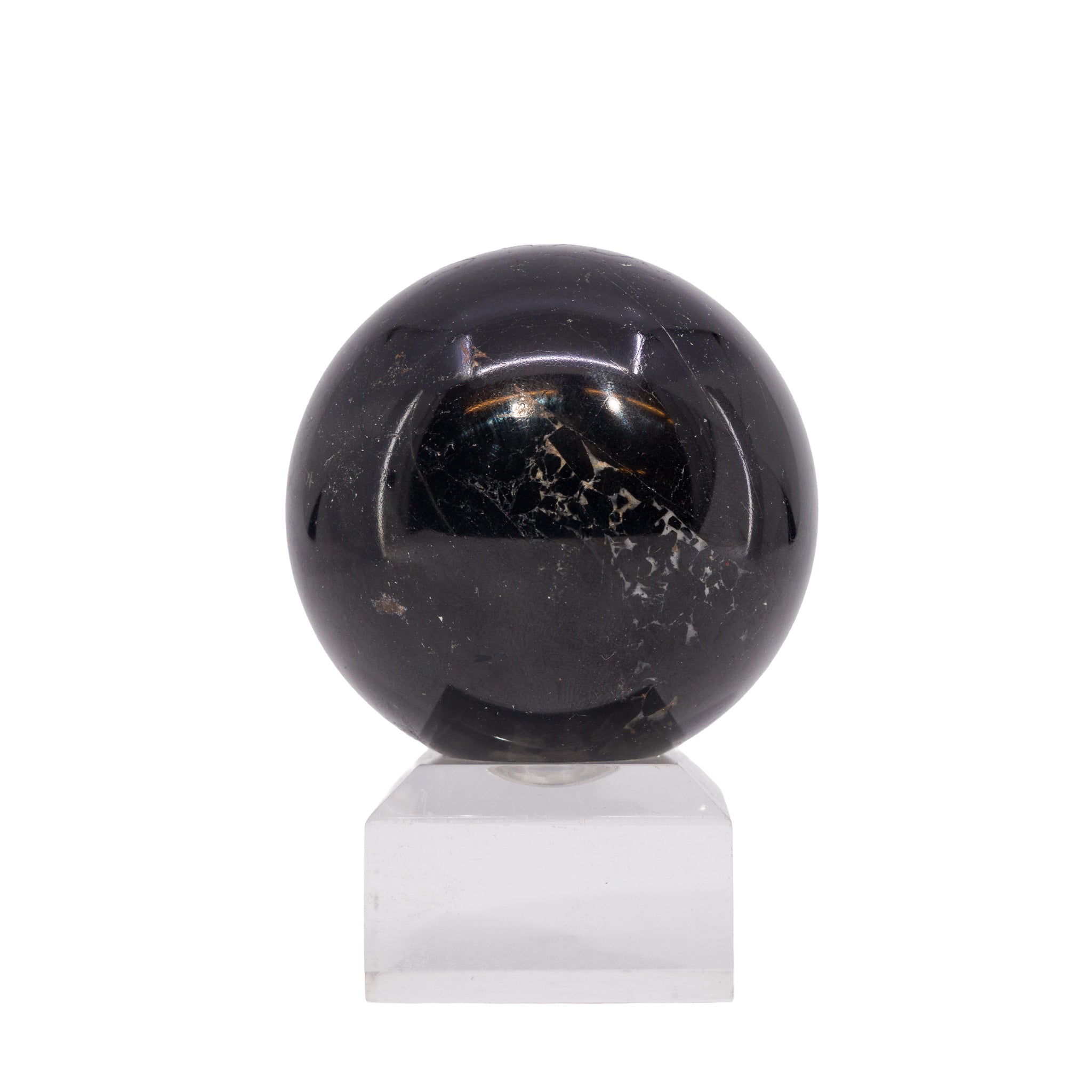 Alternate view of polished Black Tourmaline sphere showing pale mineral markings