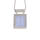 Reverse view of Blue Lace Agate pendant with Crystalarium hallmark