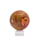 Carnelian 933 gram 3.4 inch polished crystal sphere, front view