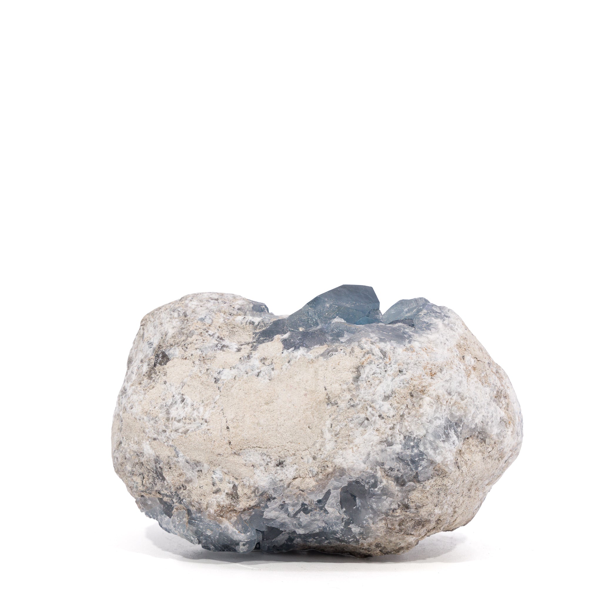 Back view of rounded Celestite geode showing its cream-gray natural matrix