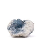 Front view of rounded Madagascar Celestite geode with large deep blue-gray crystals