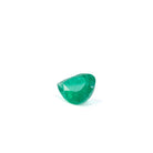 Angled view of pear-cut Colombian Emerald showing internal inclusions
