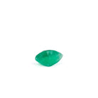 Side view of faceted Colombian Emerald showing its depth and green saturation