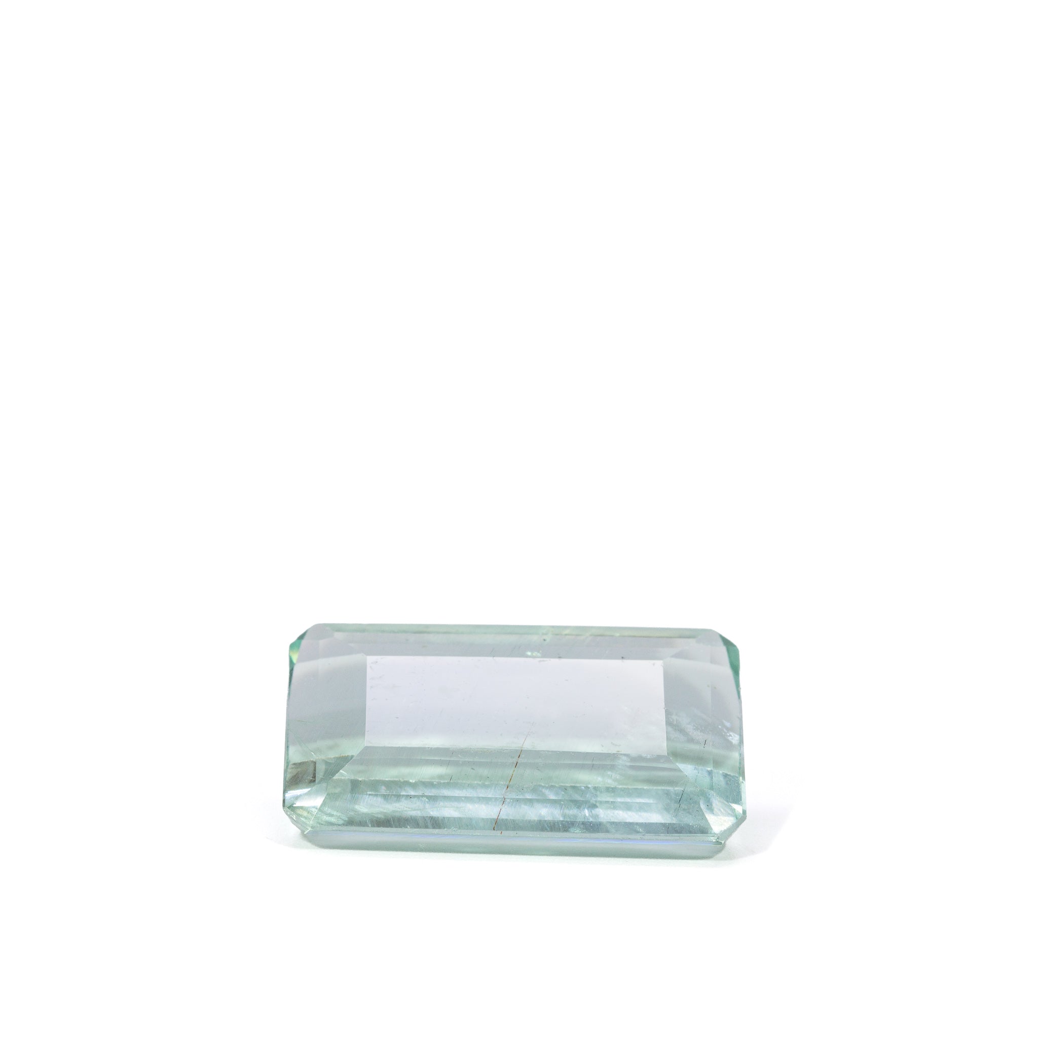 Face-up view of elongated rectangular Green Beryl gemstone