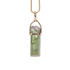 Front view of Green Tourmaline natural crystal pendant in handcrafted 14K