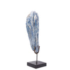 Blue bladed Kyanite crystal cluster displayed on a black metal stand, angled view