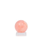 Side view of peach-pink polished Morganite sphere