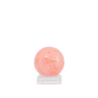 Peach-pink Morganite polished gemstone sphere, front view