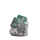 Side view of geometric green Emerald crystals in matrix