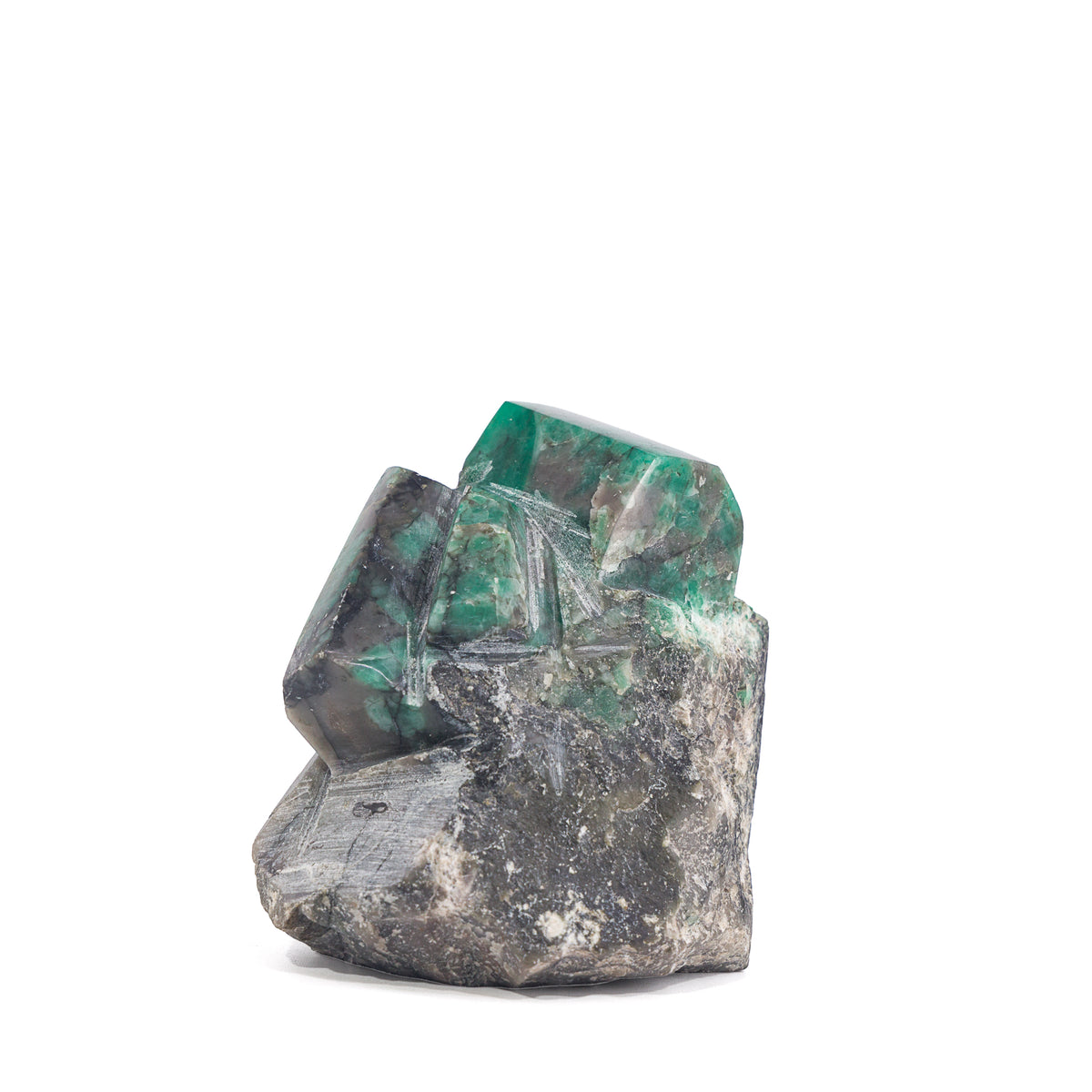 Side view of geometric green Emerald crystals in matrix