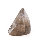 Angled view of polished Rutilated Quartz freeform showing its tapered profile