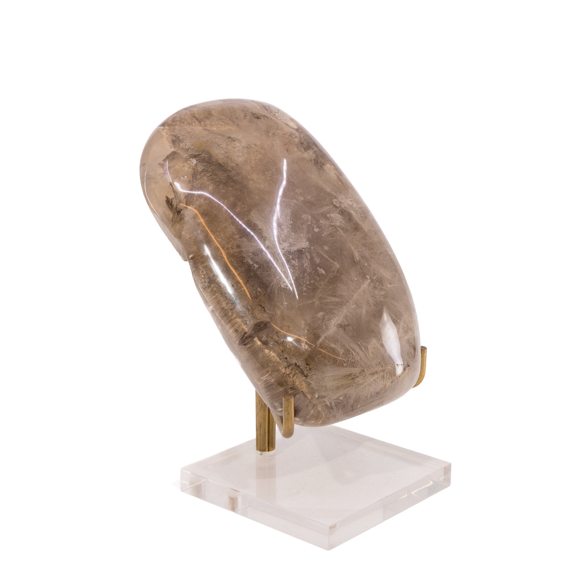 Angled view of polished Rutilated Quartz freeform with fine golden needle inclusions