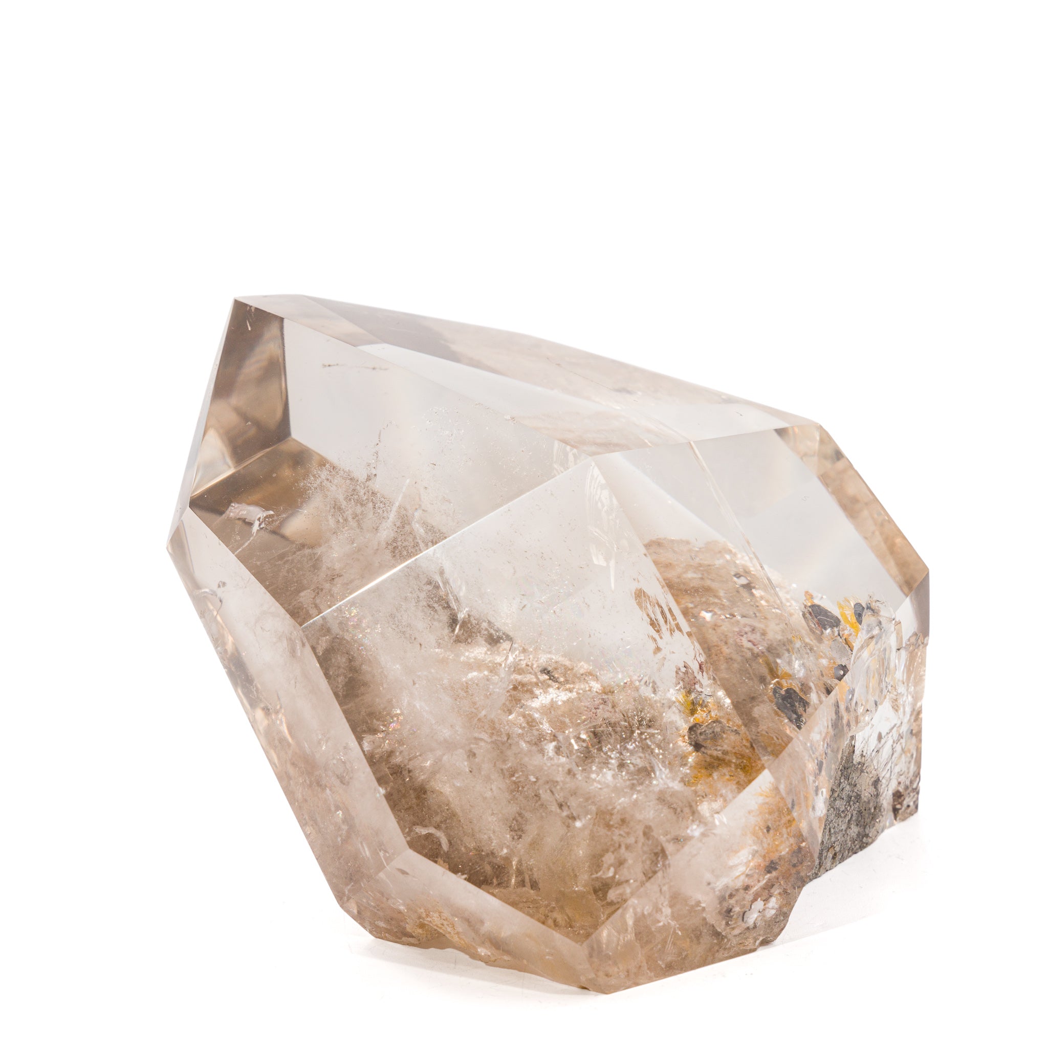Opposite face of polished Rutilated Quartz point with reflective internal veils
