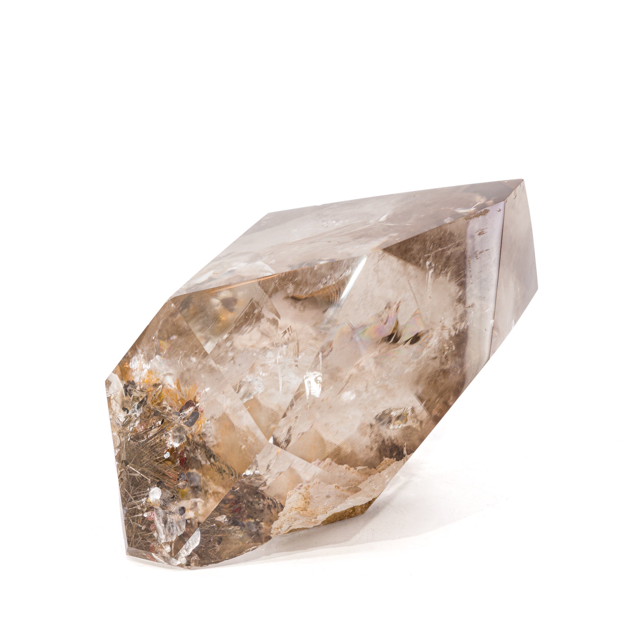 Rear angled view of Rutilated Quartz point showing internal fractures and rainbow reflections