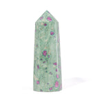 Ruby crystals distributed through green fuchsite tower