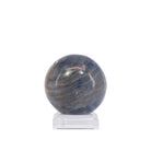 Side view of blue-gray Sapphire sphere with layered markings