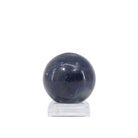 Side view of deep blue polished Sapphire sphere