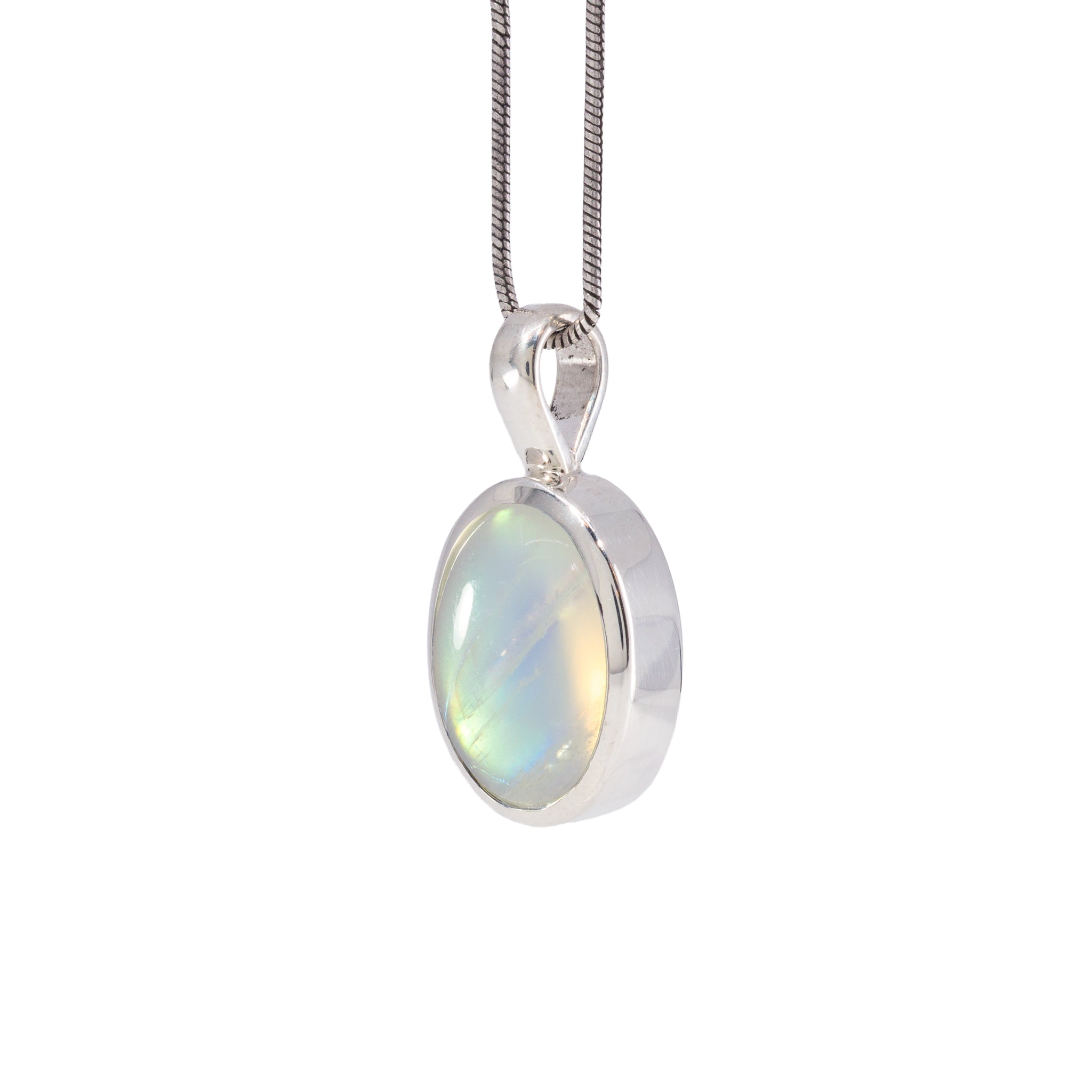 Angled view of Golden Moonstone charm pendant in Sterling Silver