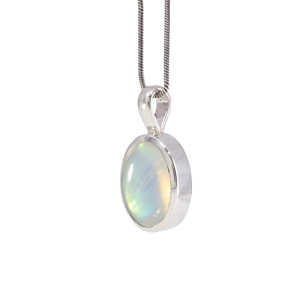 Angled view of Golden Moonstone charm pendant in Sterling Silver