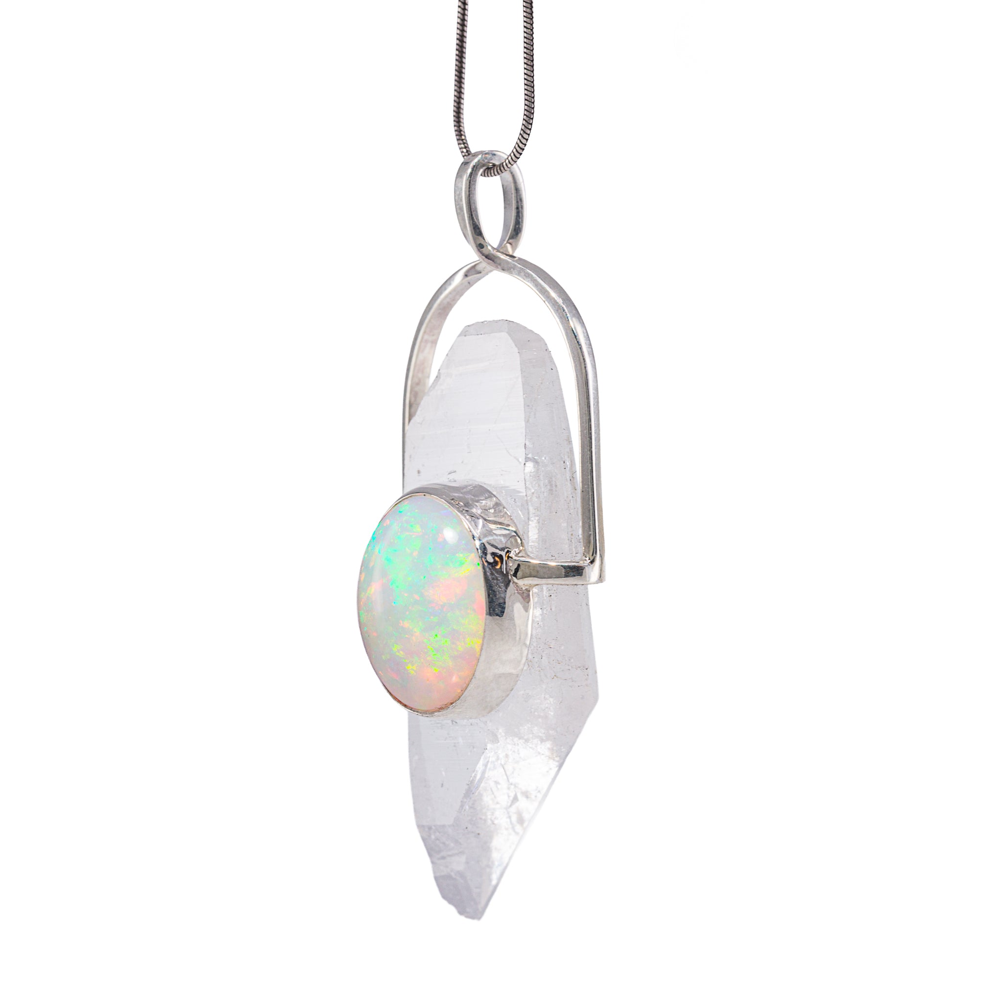 Front view of clear Quartz crystal and Opal cabochon in silver frame