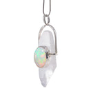 Front view of clear Quartz crystal and Opal cabochon in silver frame