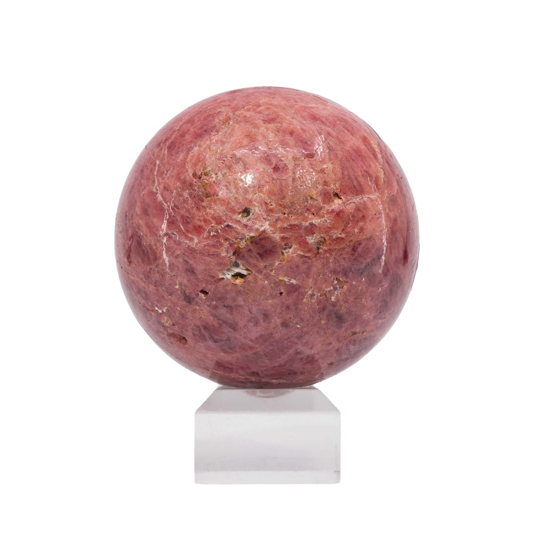 Alternate view of pink Spinel sphere showing natural matrix and cavities
