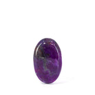 Oval Sugilite cabochon with vivid purple color and dark natural matrix