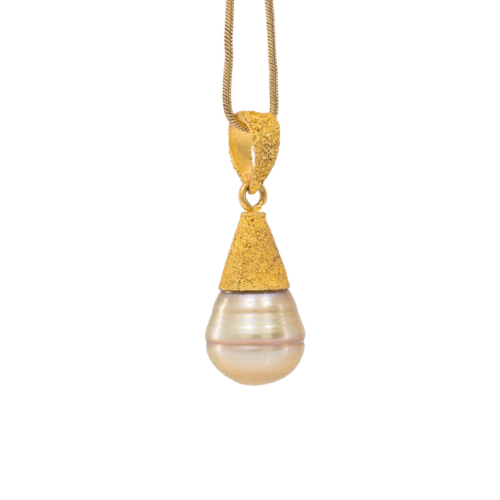Alternate view of luminous pearl pendant with textured 22K cap