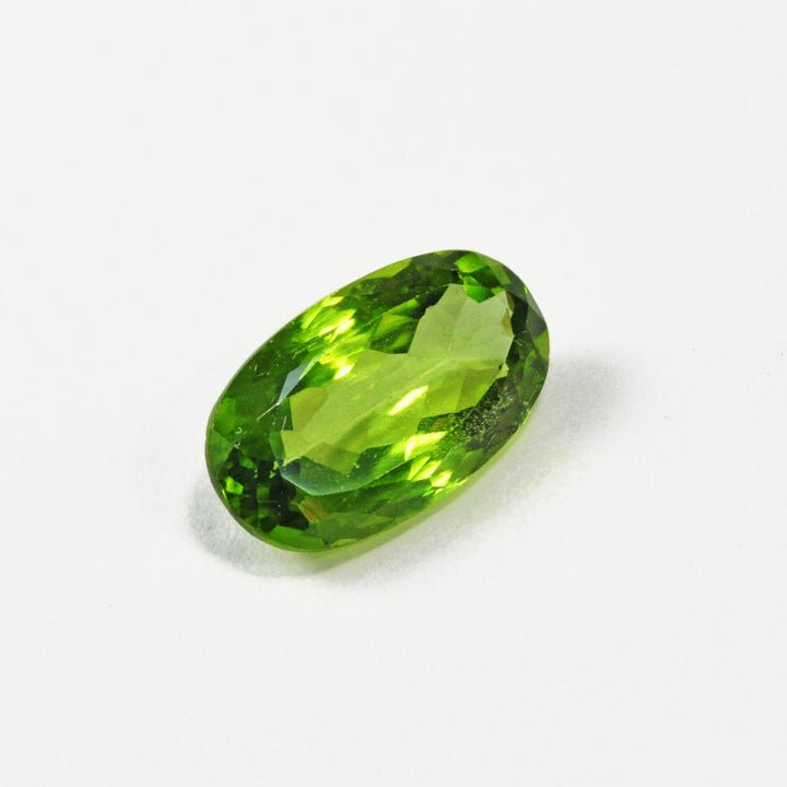 Peridot 5.0 carat 9.86 mm Faceted Oval Gemstone - 15-033 - Crystalarium